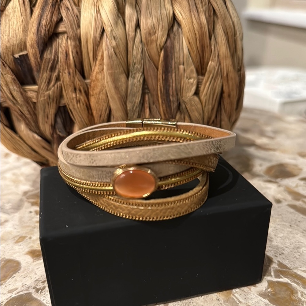 Elegant Gold and Tan Bracelet with magnetic closure